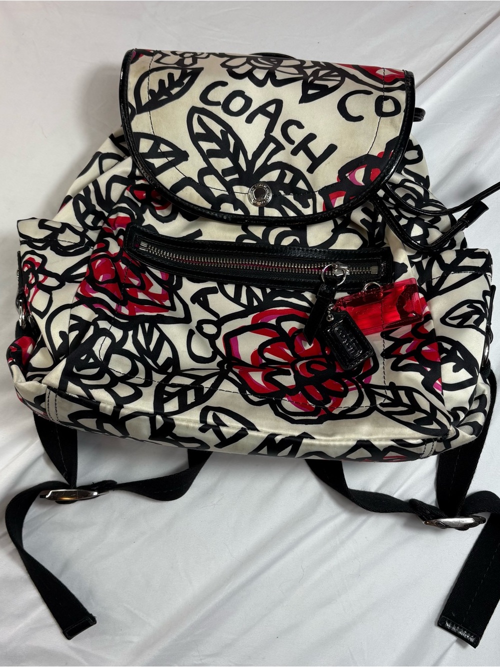 Coach poppy graffiti floral black pink backpack